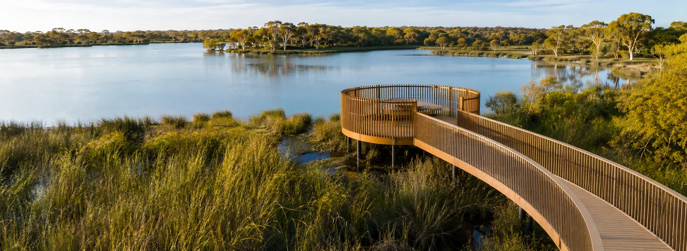 giantA collaboration with landscape architects, ecologists, planners and specialist consultants — curved timber boardwalk through wetlands to a circular lookout, reflecting our integrated multi-disciplinary design approach